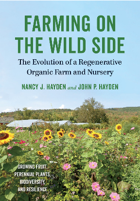Book cover shows sunflowers and other flowering plants and farm buildings in the distance
