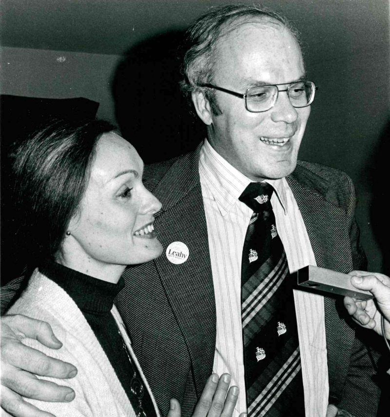 Marcelle Leahy and Senator-elect Patrick Leahy, wearing a Leahy campaign button, smiling and happy.